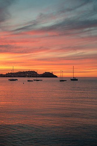 Sunset on Elba with a view of the sea & by boat