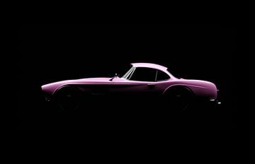 Roze vintage sportwagen van Andreas Berheide Photography