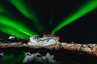 Northern lights over old fishing boat - Aasiaat, Greenland by Martijn Smeets thumbnail