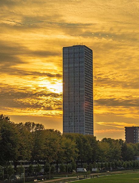 Autumn sun disappears behind the westpoint tower by Freddie de Roeck