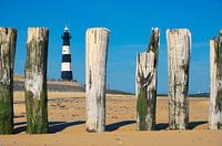 Lighthouse protected by breakwaters