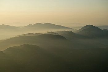 A misty morning between the mountains around the Catalan Montserrat.