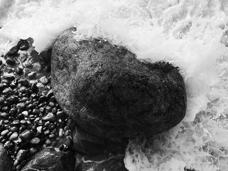Stone in the surf, photographed from above by Jörg Hausmann