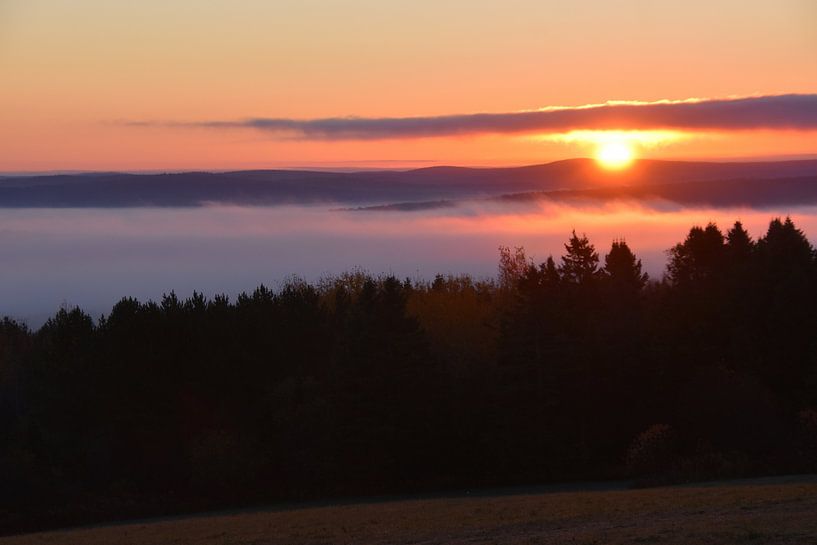 A sunrise on an autumn morning by Claude Laprise