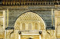 Facade with Arabic decorations in a medersa in Fez in Morocco