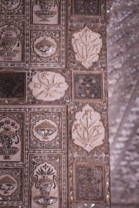 Mozaik in het Amber Fort van Jaipur.