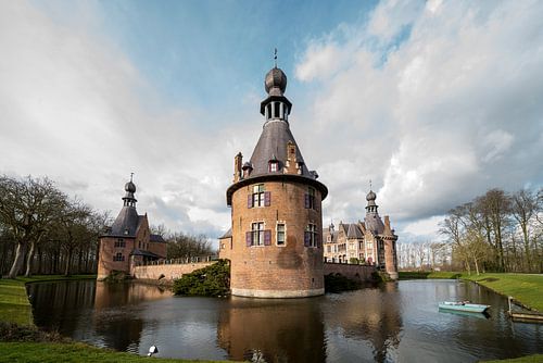 On a cloudy day near a beautiful and large castle