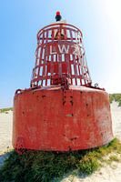 Old sea buoy at Terschelling West aan Zee