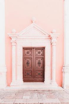Mediterranean style - antique door and pink wall decoration