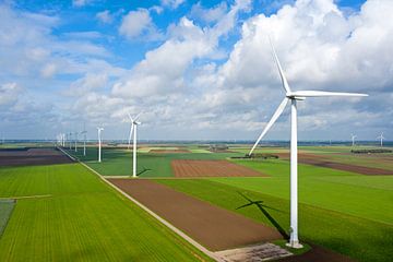 Aerial view of rural wind turbines in Friesland Netherlands by Eye on You