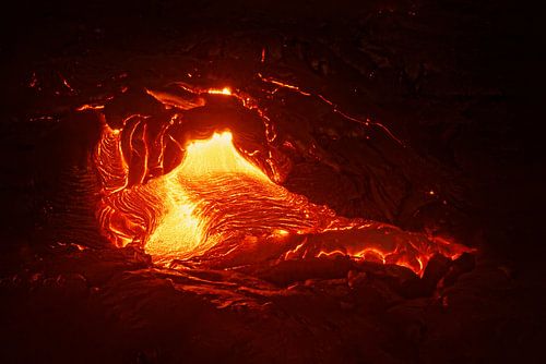 Lava flows out of a fissure