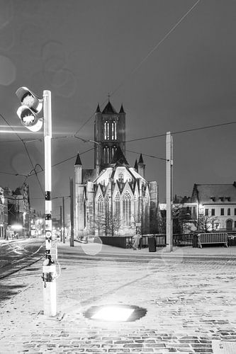 During snowfall the Belfry of Ghent in black and white