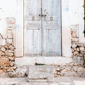 The blue door of Crete by Kaylee Burger