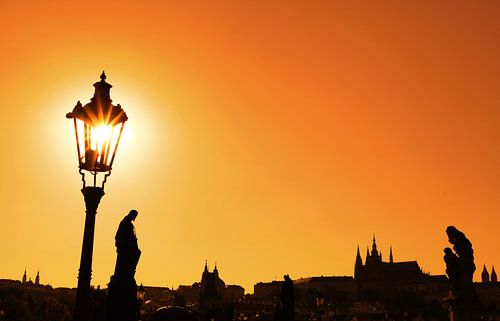 Sunset silhouettes of Charles Bridge in Prague
