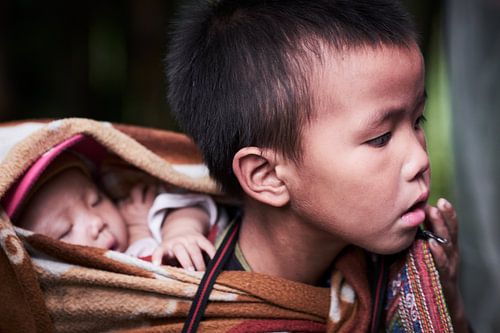 Vietnamese boy with baby