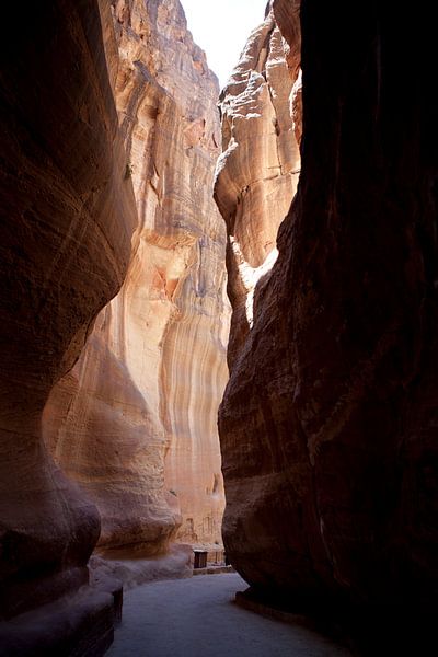 Light and dark at rocks in Petra by Kees van Dun