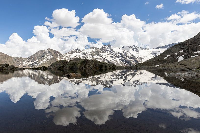 Reflective mountain lake Gran Paradiso by Arjen Heeres