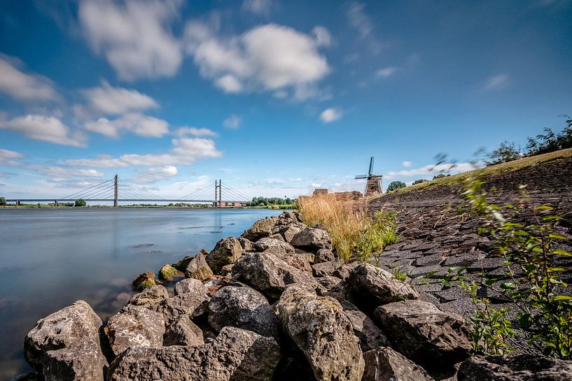 Uitzicht over het landschap van de de IJsseldelta van Fotografiecor .nl