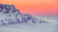 Untersberg at sunset, above the clouds in the evening in Bavaria by Daniel Pahmeier thumbnail