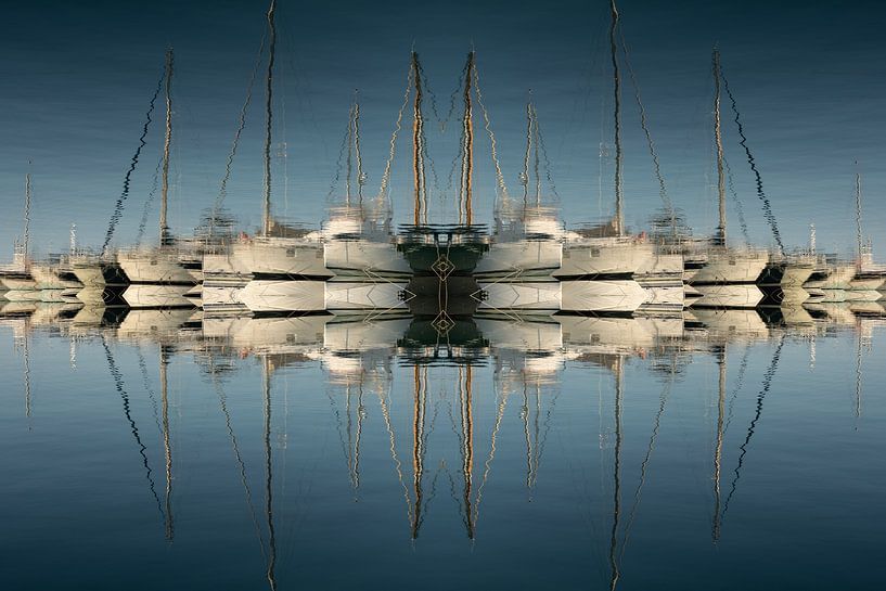 Reflections of sailboats in blue seawater by Adriana Mueller