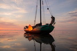 Falling dry on the Wadden Sea at sunset by Hette van den Brink