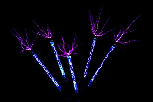 Discharges from a tesla coil via flash tubes
