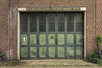 Weathered warehouse door by MMFoto