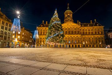Christmas on the Dam Square in Amsterdam by night by Eye on You