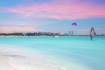Watersports on the Caribbean Sea at Palm Beach on Aruba at sunset by Eye on You