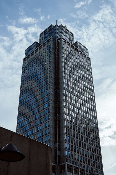 A blue cloudy day with blue buildings | Amsterdam | The Netherlands Travel Photography by Dohi Media