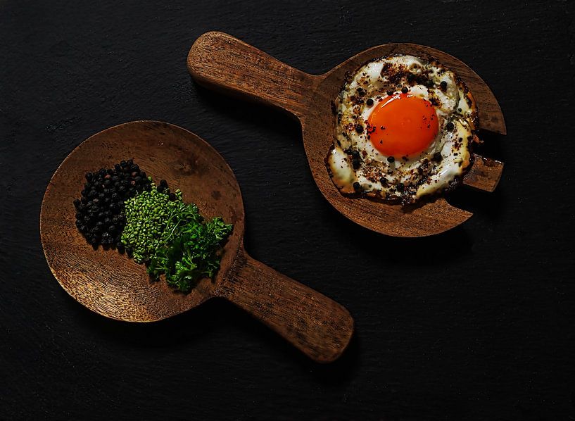 Still life with fried egg , Parsley and peppercorns. by Saskia Dingemans Awarded Photographer