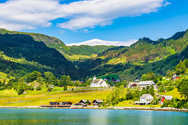 View across the Åkrafjord towards the village of Åkra in Norway by Rico Ködder