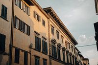 Buildings in sunset, yellow, blue sky in Florence