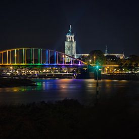 Rainbow coloured bridge near Deventer over river IJssel because of Coming Out Day