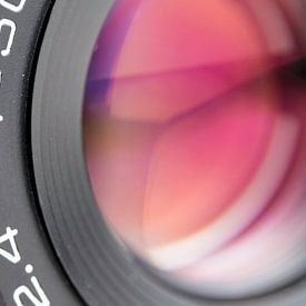 Macro close-up of lens from vintage 'Praktica' camera, abstract and colorful by Iris Koopmans