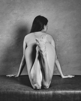 Très belle femme nue photographiée de dos.
