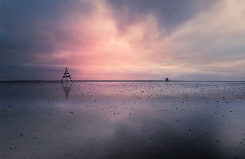 Clouds over the englishman plate on the mud flats by peterheinspictures