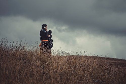 Tibetan woman on the phone