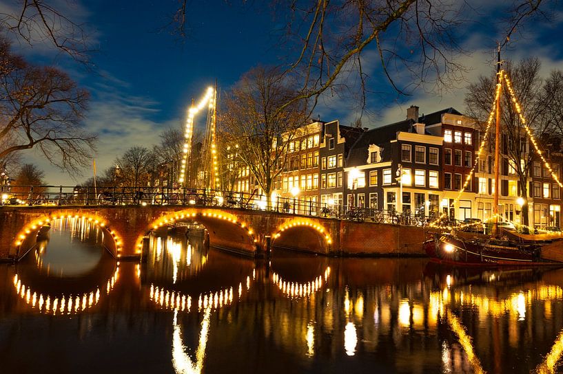 Amsterdam illuminiated classic sailing boats in the downtown canals by Sjoerd van der Wal Photography