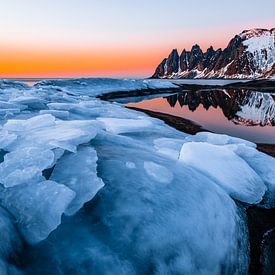Atmospheric orange glow over Senja (Norway) by Martijn Smeets