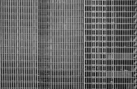 The Geometric Façade of De Rotterdam in Black and White by Bas Potman