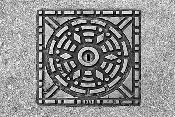 Putdeksel met geometrisch patroon