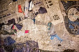 A newspaper on the street. by Karsten Rahn