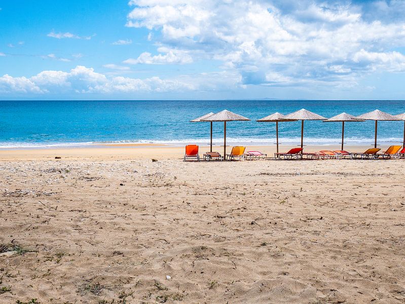 beach umbrellas in Greece by Charlotte Dirkse