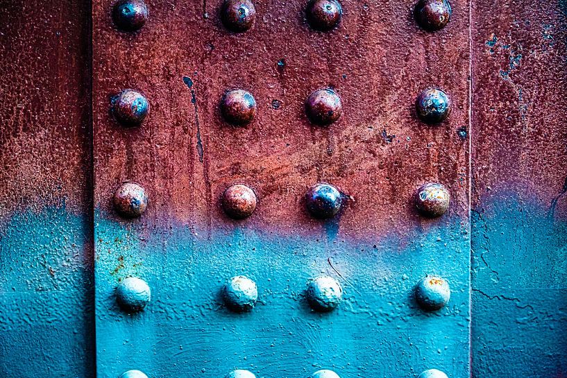 Metal surface blue rust brown with steel rivets by Dieter Walther