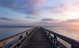 De pier van Zingst bij zonsopgang van Nils Steiner