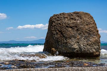 Waves breaking on rocks in the Mediterranean with turquoise-coloured water by Animaflora PicsStock