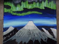 Northern lights over the mountains