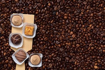 Chocolates on coffee by Ulrike Leone