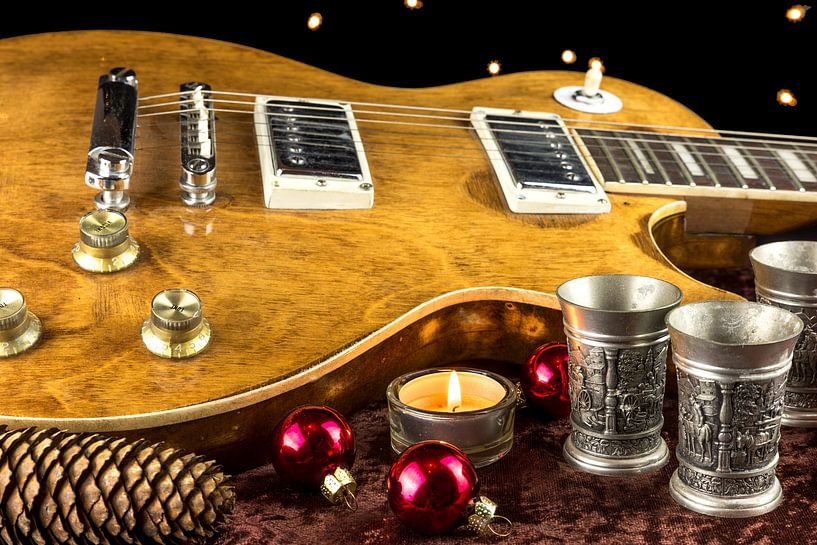 E-Guitar with cup and candle christmasy decorated by Hans-Jürgen Janda